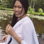 Jendhamuni-at-pond-holding-flower062115