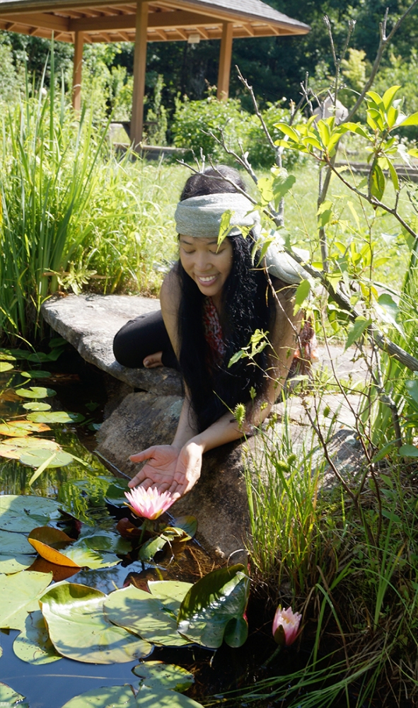 jendhamuniholdinglotusflower