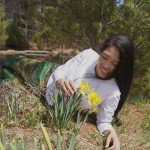 Jendhamuni at the pond with flowers April 8, 2015