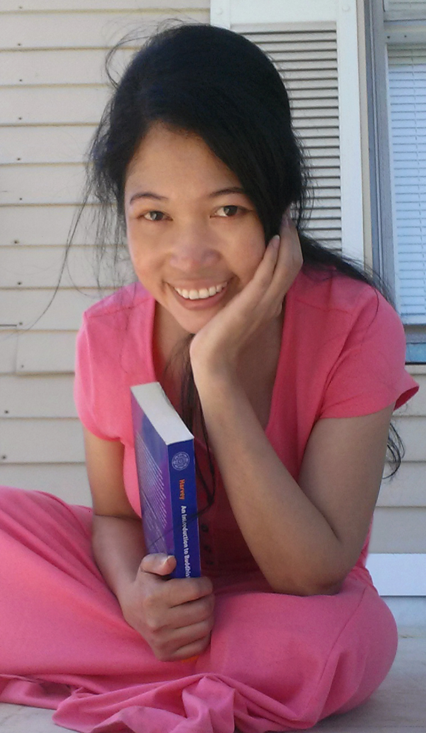 Jendhamuni holding book