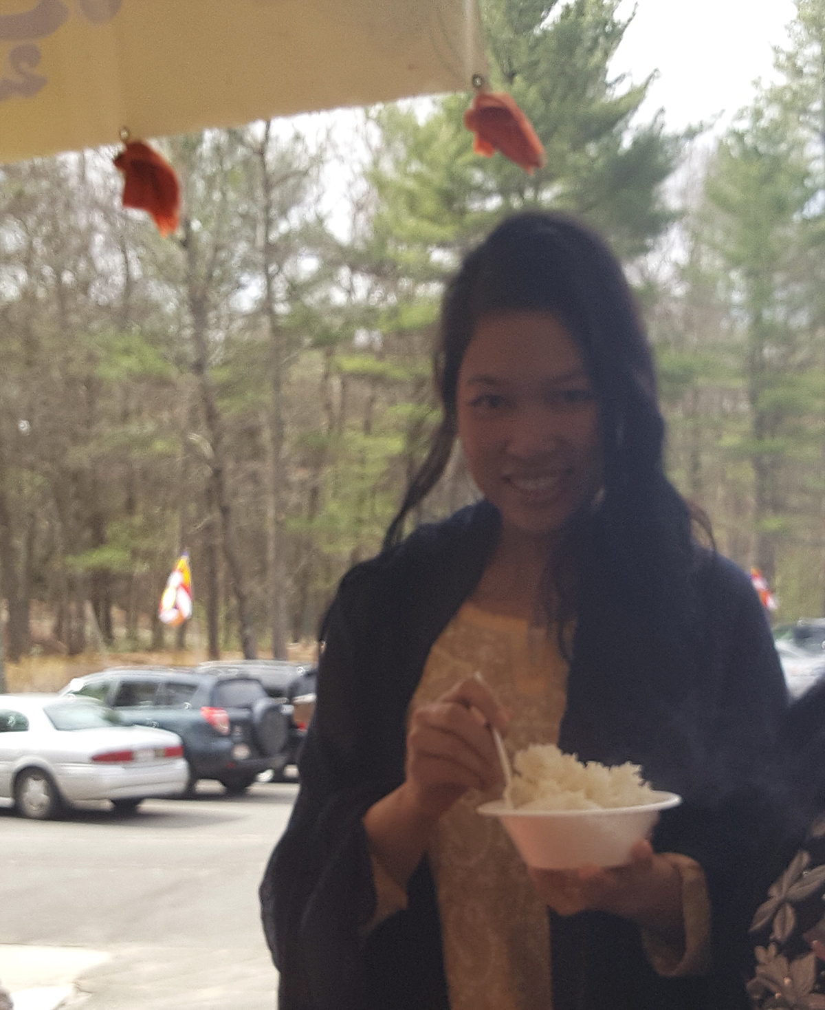 Jendhamuni holding rice April 15, 2017